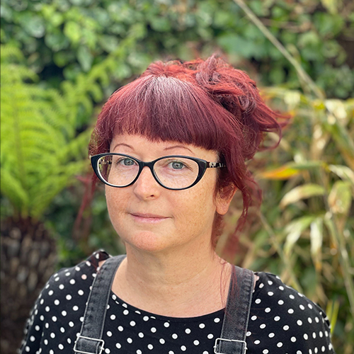 Helen Benians in a garden